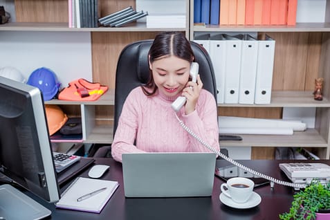 Young woman working office.